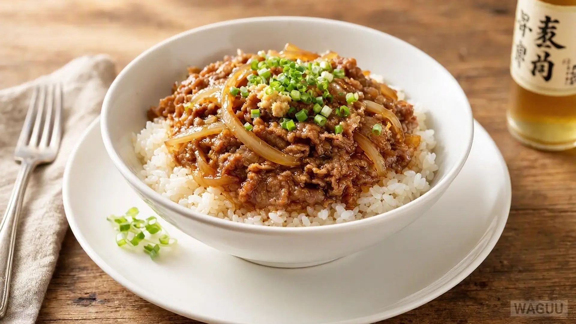 Gyūdon – a bowl of hot rice topped with thin slices of beef and onions simmered in a sauce made of soy sauce, mirin, and dashi.
