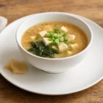 Miso Shiru – a traditional Japanese soup made from dashi stock and miso paste, usually with tofu, wakame seaweed and spring onions.
