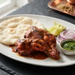 Tandoori Chicken – kuře marinované v jogurtu a koření a pečené při vysoké teplotě