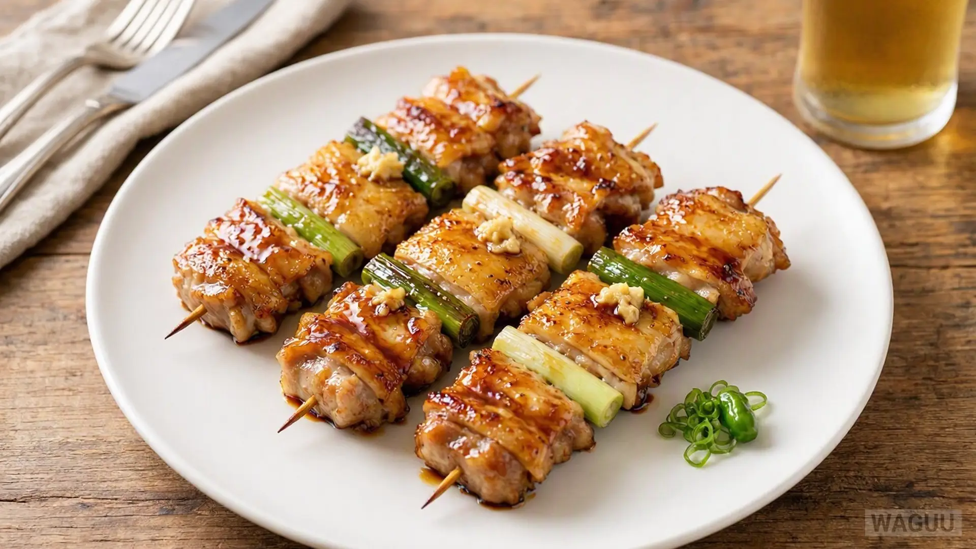 Yakitori – chicken pieces skewered and grilled over heat, seasoned with salt or a sweet and savory tare sauce.